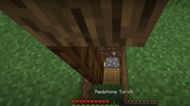 Covering your entrance with a tree can keep you safe in a forest base (Image via Kwipla/YouTube)